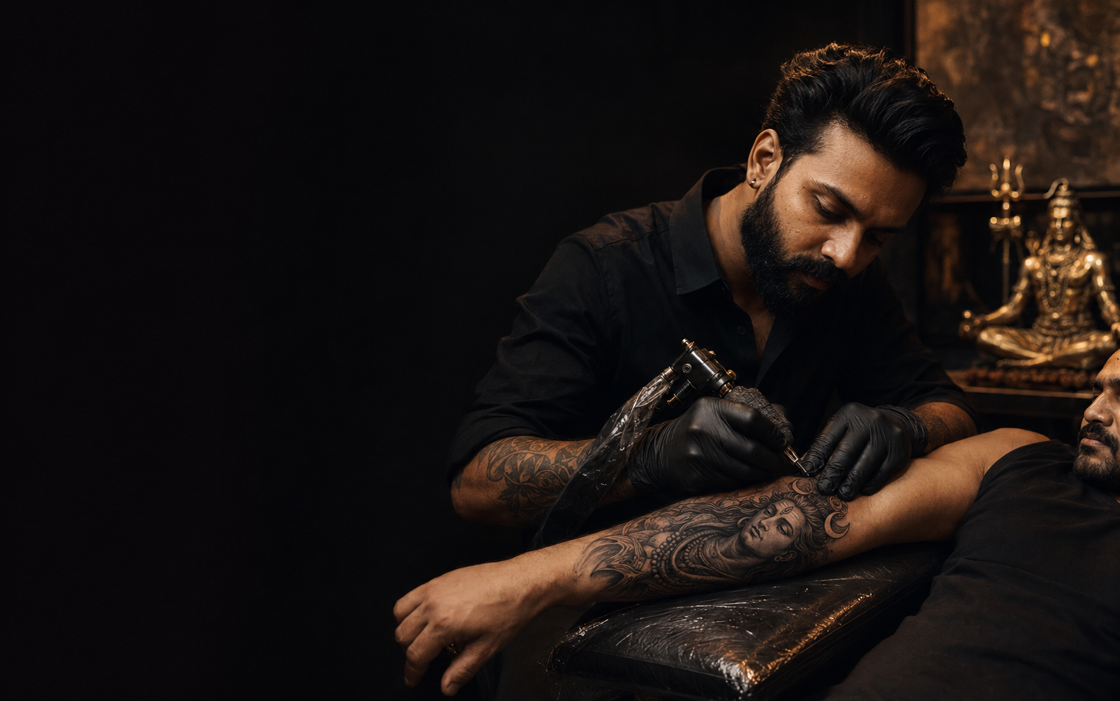 Tattoo artist creating an intricate custom tattoo